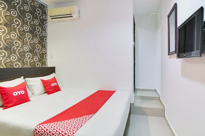 Imagen de la habitación del Hotel Oyo 89407 Ezi. Foto 12