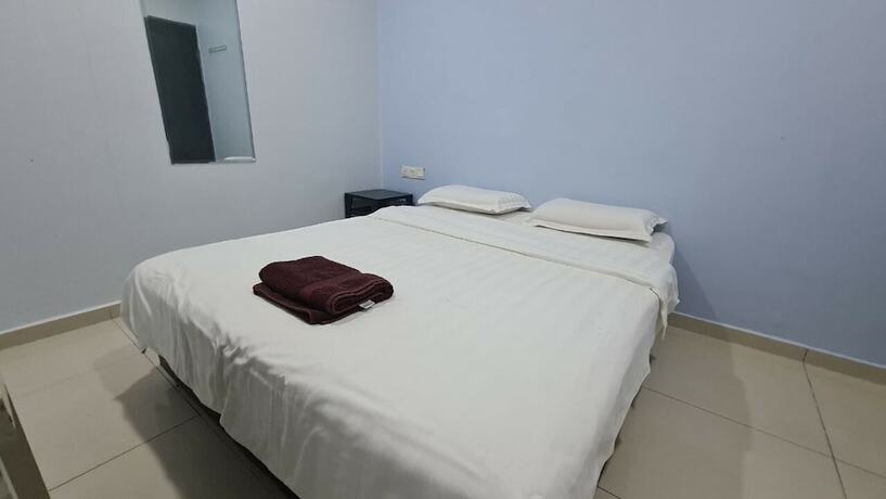 Imagen de la habitación del Hotel Oyo 89407 Ezi. Foto 13