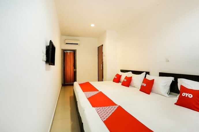 Imagen de la habitación del Hotel Oyo 89407 Ezi. Foto 18