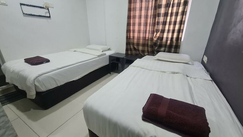 Imagen de la habitación del Hotel Oyo 89407 Ezi. Foto 19