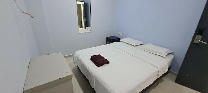 Imagen de la habitación del Hotel Oyo 89407 Ezi. Foto 27