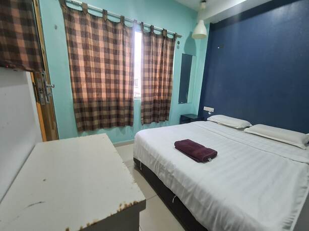 Imagen de la habitación del Hotel Oyo 89407 Ezi. Foto 28