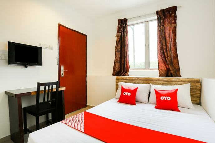Imagen de la habitación del Hotel Oyo 89407 Ezi. Foto 31