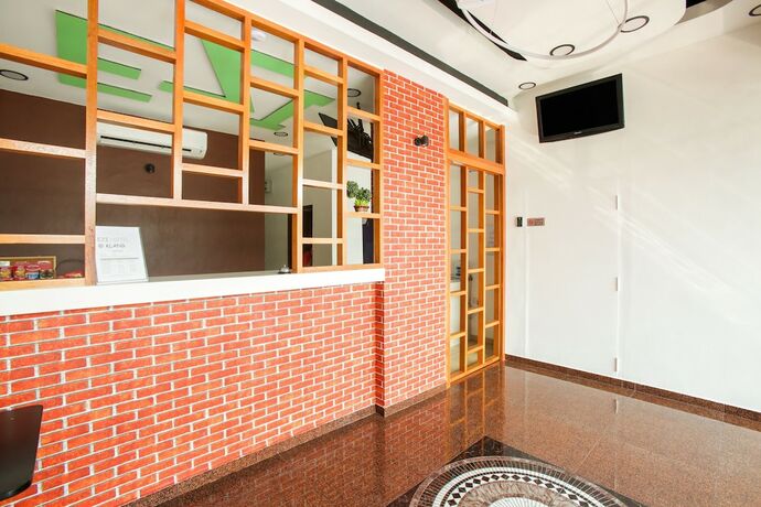 Imagen de los interiores del Hotel Oyo 89407 Ezi. Foto 37