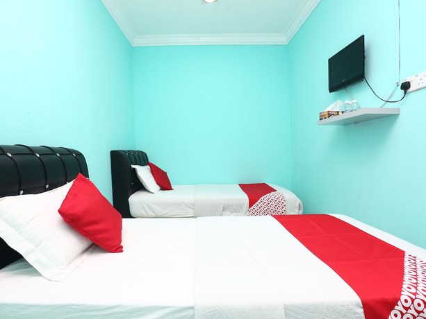 Imagen de la habitación del Hotel Oyo 89498 Sri Seroja Inn Budget. Foto 4