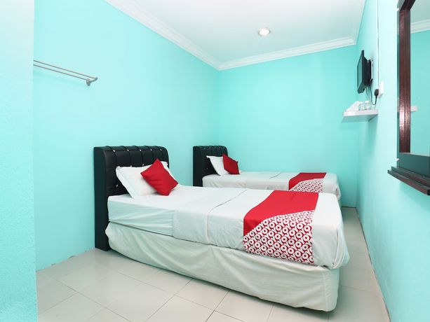 Imagen de la habitación del Hotel Oyo 89498 Sri Seroja Inn Budget. Foto 7
