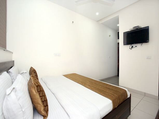 Imagen de la habitación del Hotel Oyo 8959 New Dk Palace. Foto 25