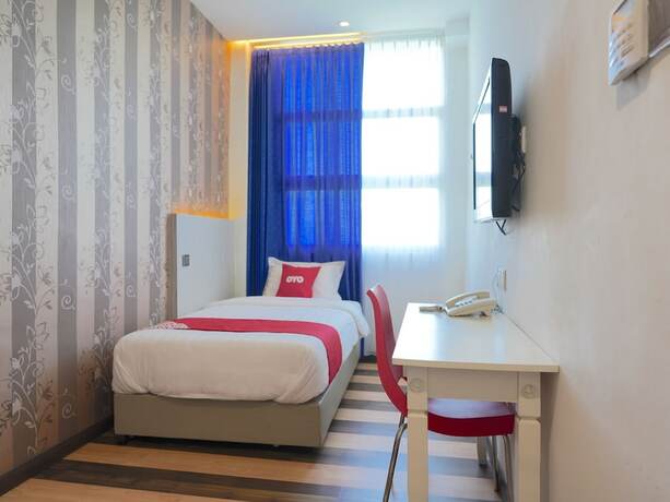 Imagen de la habitación del Hotel Oyo 89624 4orty Inn. Foto 6