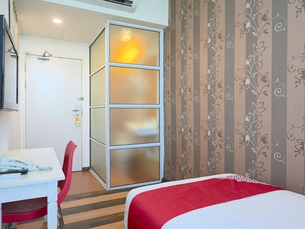Imagen de la habitación del Hotel Oyo 89624 4orty Inn. Foto 8