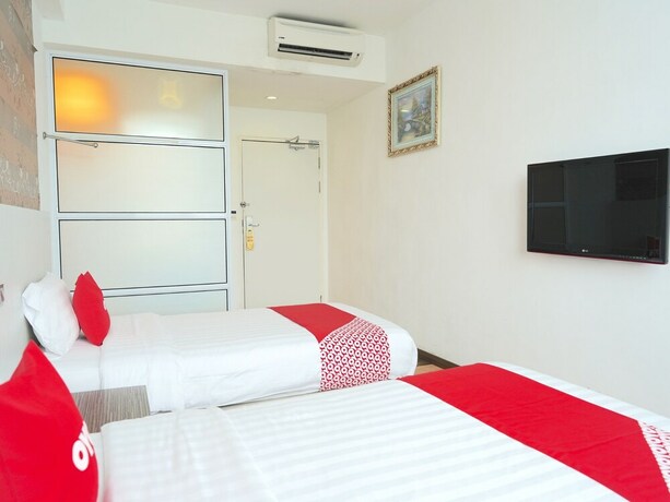 Imagen de la habitación del Hotel Oyo 89624 4orty Inn. Foto 12