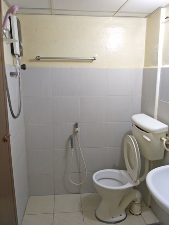 Imagen de la habitación del Hotel Oyo 89651 Harmoni, Kota Bharu. Foto 5