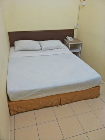 Imagen de la habitación del Hotel Oyo 89651 Harmoni, Kota Bharu. Foto 7
