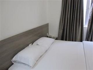 Imagen de la habitación del Hotel Oyo 89655 Sri Duta. Foto 11