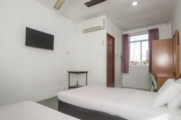 Imagen de la habitación del Hotel Oyo 89706 To-day. Foto 13
