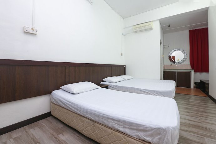 Imagen de la habitación del Hotel Oyo 89755 Dandd Budget Inn. Foto 2