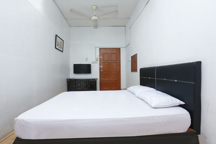 Imagen de la habitación del Hotel Oyo 89755 Dandd Budget Inn. Foto 7