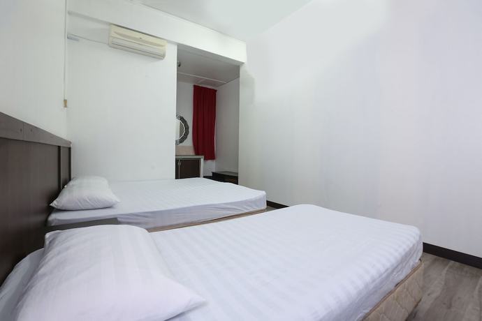 Imagen de la habitación del Hotel Oyo 89755 Dandd Budget Inn. Foto 9