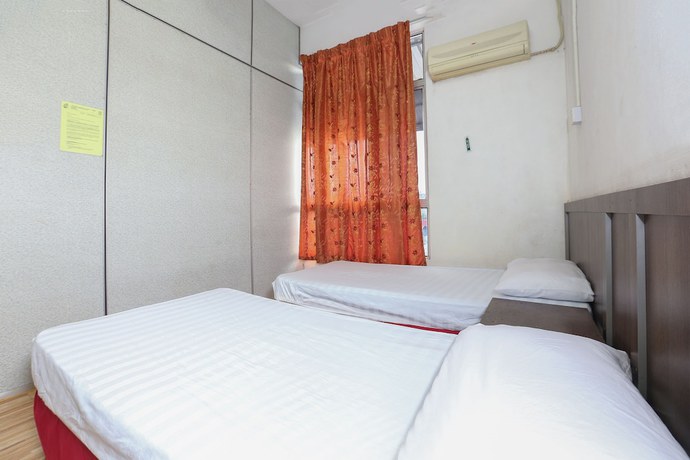 Imagen de la habitación del Hotel Oyo 89755 Dandd Budget Inn. Foto 11