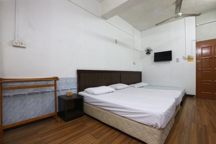 Imagen de la habitación del Hotel Oyo 89755 Dandd Budget Inn. Foto 16