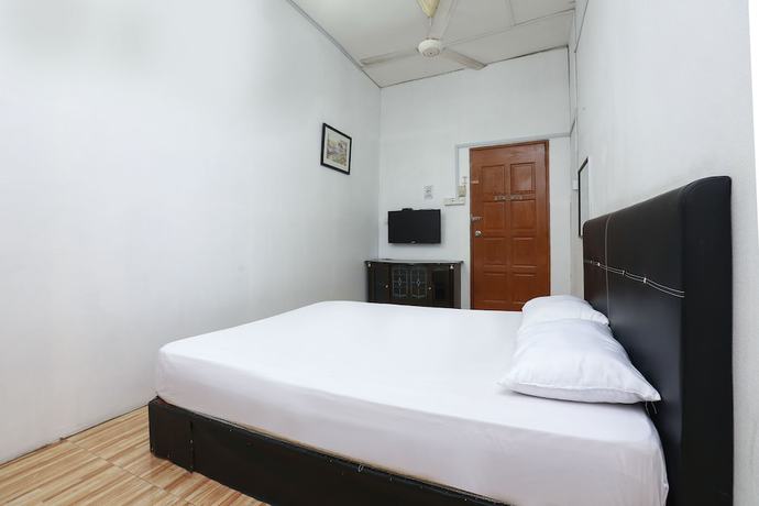 Imagen de la habitación del Hotel Oyo 89755 Dandd Budget Inn. Foto 17