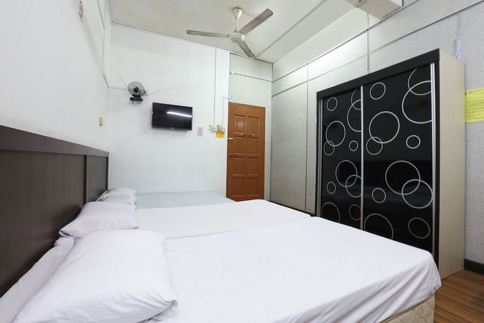 Imagen de la habitación del Hotel Oyo 89755 Dandd Budget Inn. Foto 18