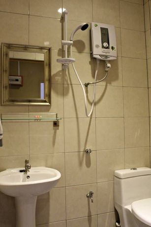 Imagen de los exteriores del Hotel Oyo 89780 Lodge 37. Foto 9