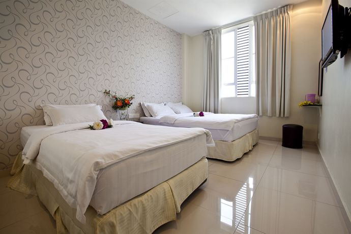 Imagen de la habitación del Hotel Oyo 89810 In@hotel Taman Gaya. Foto 6