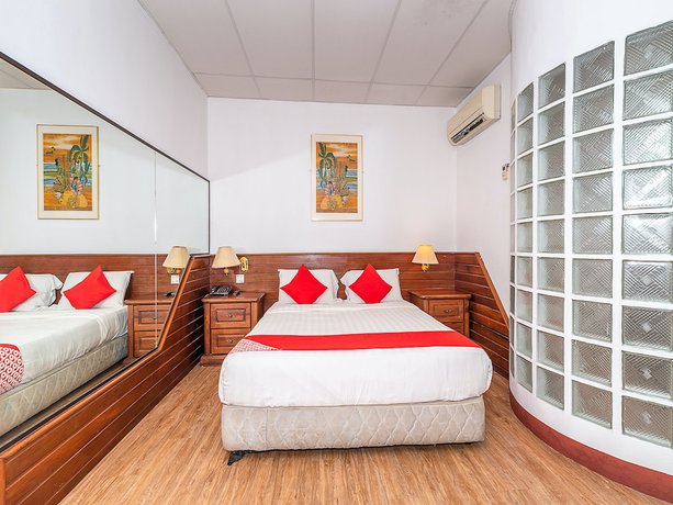 Imagen de la habitación del Hotel Oyo 89864 Holiday Park. Foto 3