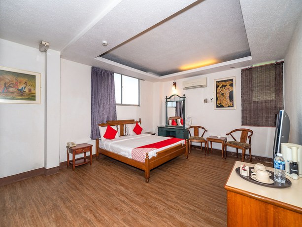 Imagen de la habitación del Hotel Oyo 89864 Holiday Park. Foto 4