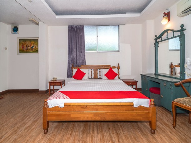 Imagen de la habitación del Hotel Oyo 89864 Holiday Park. Foto 5