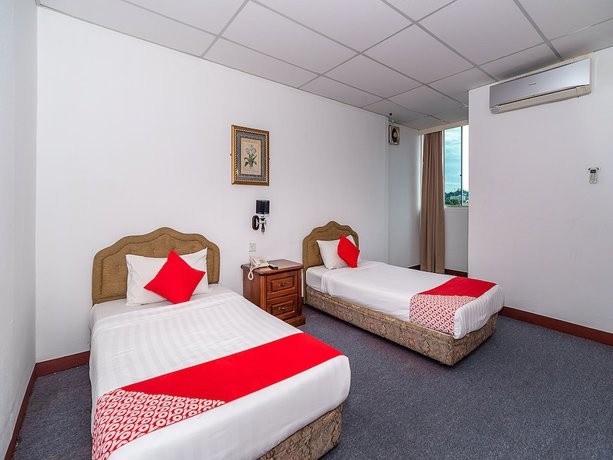 Imagen de la habitación del Hotel Oyo 89864 Holiday Park. Foto 6