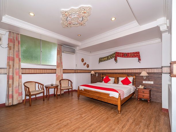 Imagen de la habitación del Hotel Oyo 89864 Holiday Park. Foto 8