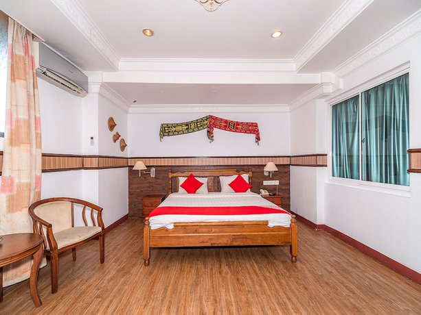 Imagen de la habitación del Hotel Oyo 89864 Holiday Park. Foto 9