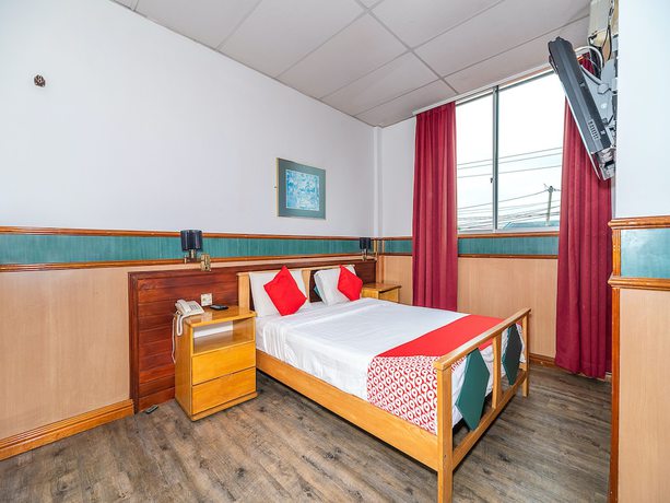 Imagen de la habitación del Hotel Oyo 89864 Holiday Park. Foto 10