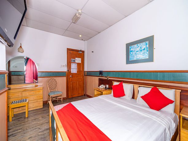 Imagen de la habitación del Hotel Oyo 89864 Holiday Park. Foto 11