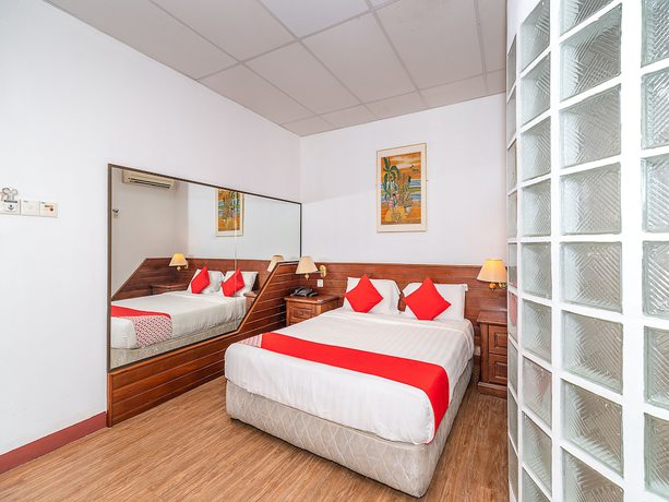Imagen de la habitación del Hotel Oyo 89864 Holiday Park. Foto 12
