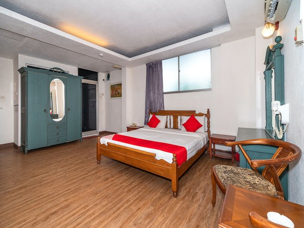 Imagen de la habitación del Hotel Oyo 89864 Holiday Park. Foto 13