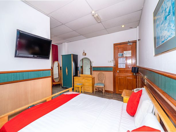 Imagen de la habitación del Hotel Oyo 89864 Holiday Park. Foto 15