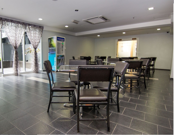 Imagen del bar/restaurante del Hotel Oyo 90150 City Campus Lodge and Hotel. Foto 4