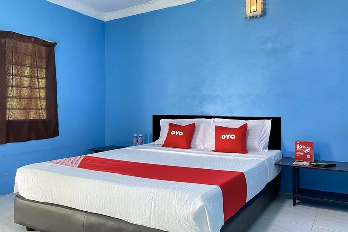 Imagen de la habitación del Hotel Oyo 90168 Serambi Pelangi Chalet. Foto 22