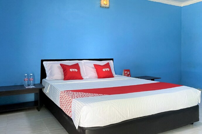 Imagen de la habitación del Hotel Oyo 90168 Serambi Pelangi Chalet. Foto 23