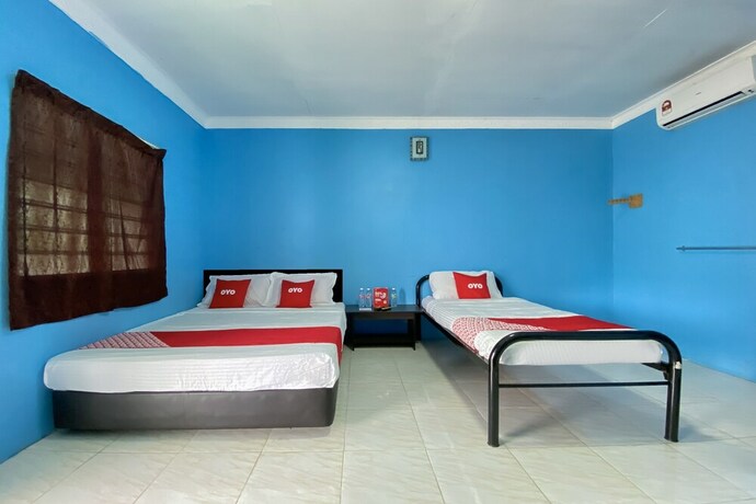 Imagen de la habitación del Hotel Oyo 90168 Serambi Pelangi Chalet. Foto 25