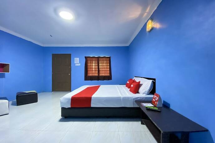 Imagen de la habitación del Hotel Oyo 90168 Serambi Pelangi Chalet. Foto 29