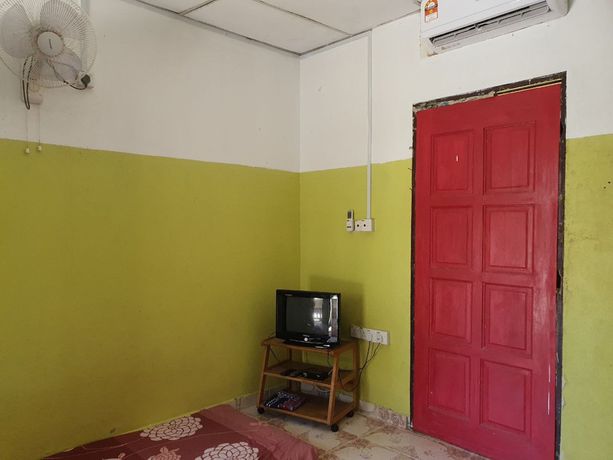 Imagen de la habitación del Hotel Oyo 90302 Dimuara Chalet Tok Bali. Foto 6