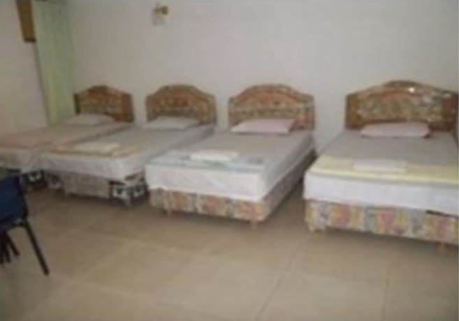 Imagen de la habitación del Hotel Oyo 90494 Sam Huat. Foto 5