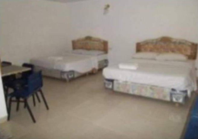 Imagen de la habitación del Hotel Oyo 90494 Sam Huat. Foto 8