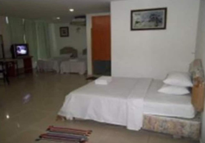 Imagen de la habitación del Hotel Oyo 90494 Sam Huat. Foto 10