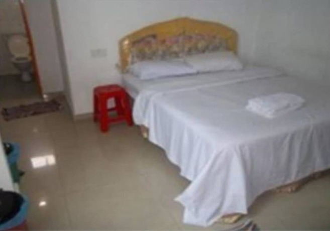 Imagen de la habitación del Hotel Oyo 90494 Sam Huat. Foto 14