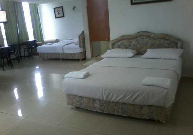 Imagen de la habitación del Hotel Oyo 90494 Sam Huat. Foto 16