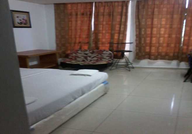 Imagen de la habitación del Hotel Oyo 90494 Sam Huat. Foto 17